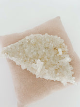 Load image into Gallery viewer, A clear quartz point used to bring harmony and enhance positive vibrations.