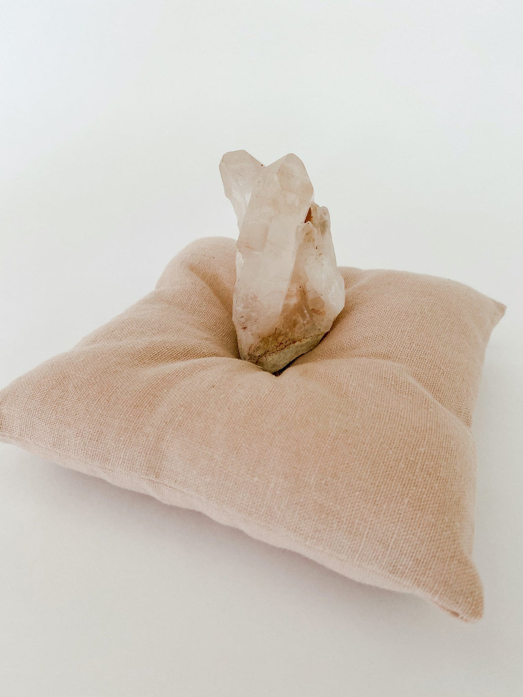 A pink himalayan quartz cluster, a reflection of unconditional love and harmony.